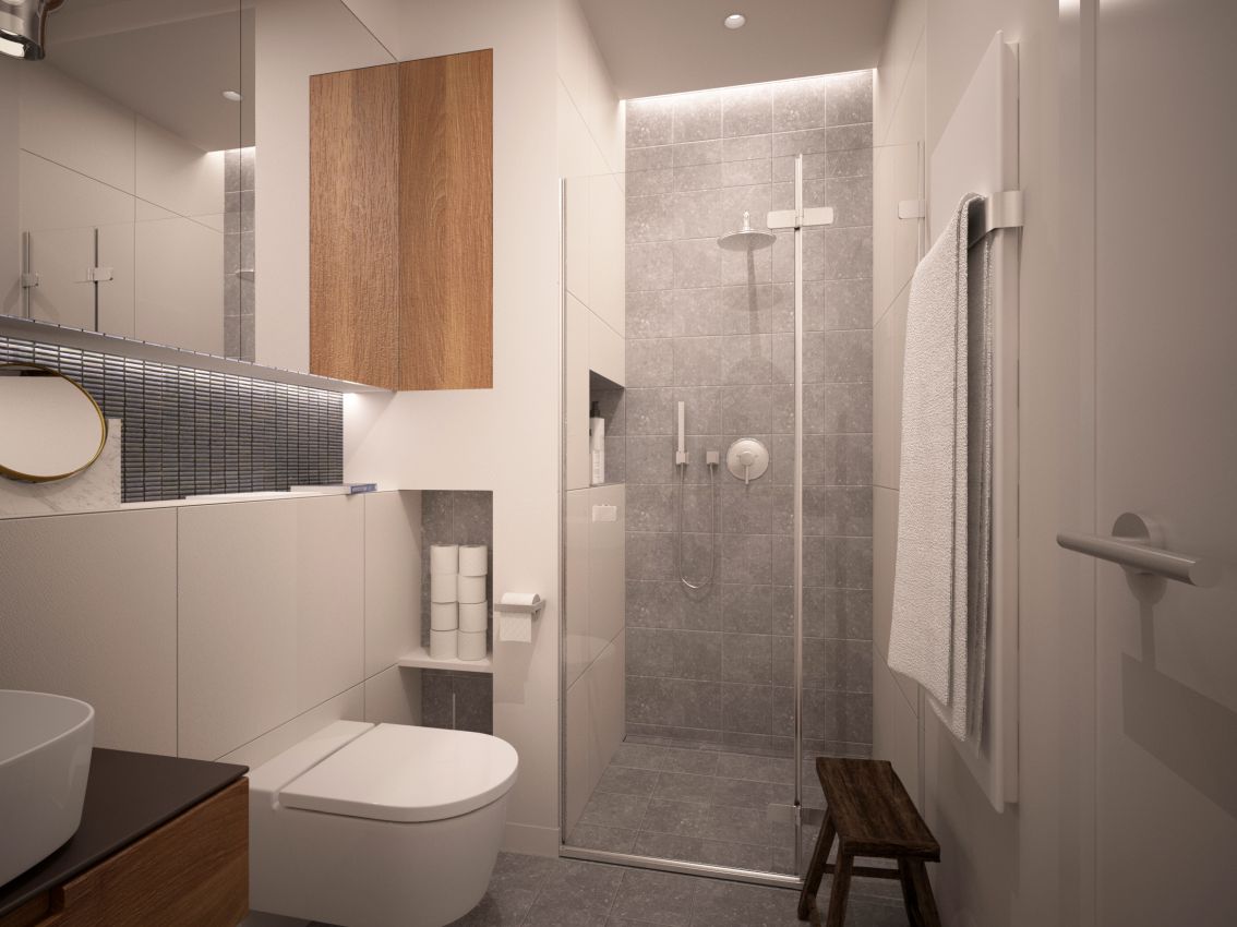 Mała łazienka przy sypialni z szafkami i półkami na najpotrzebniejsze rzeczy.